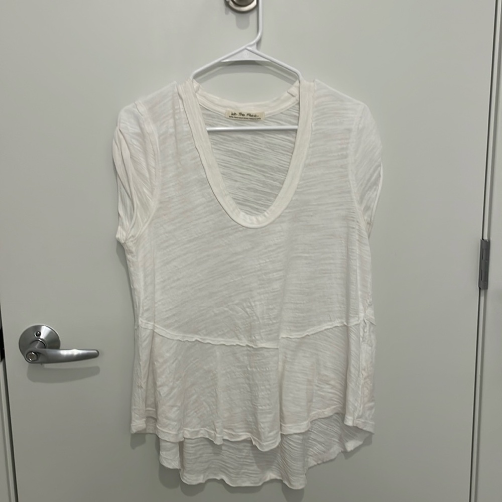 We the Free fashion tee, short sleeves, long tail, very fashionable with jeans